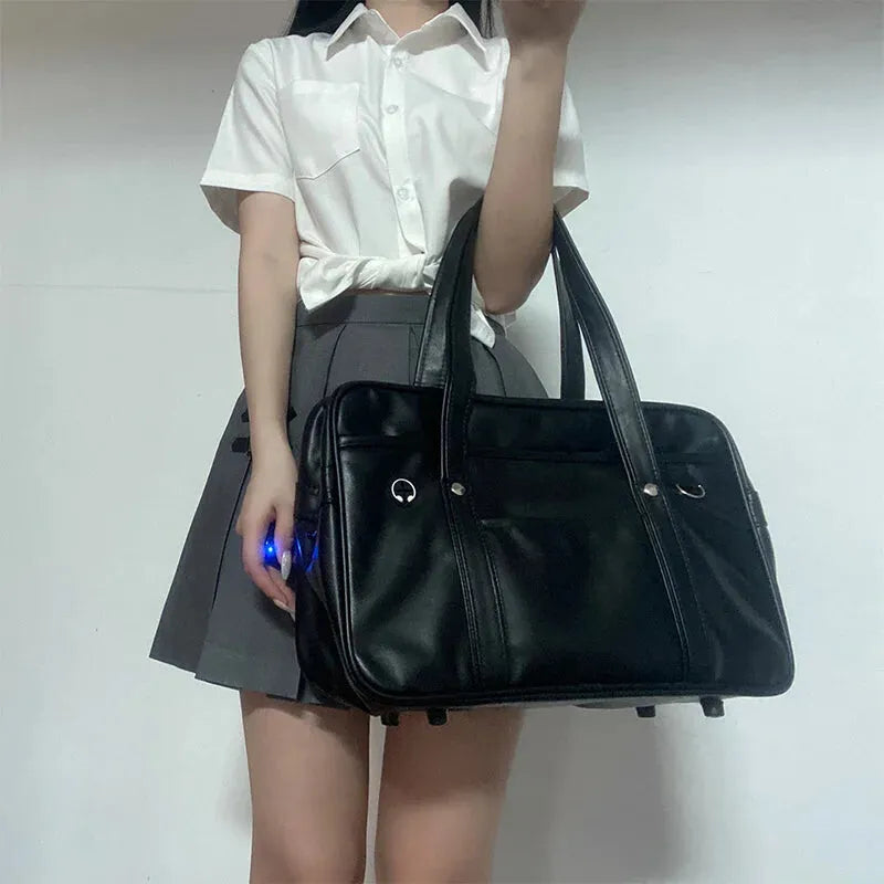 Grand sac à main de cours Clara